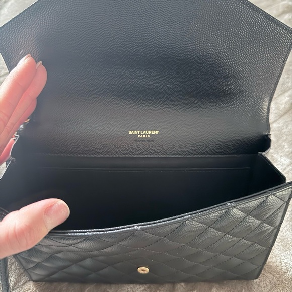 Yves Saint Laurent Quilted Black Clutch with Gold Emblem - Picture 4 of 9